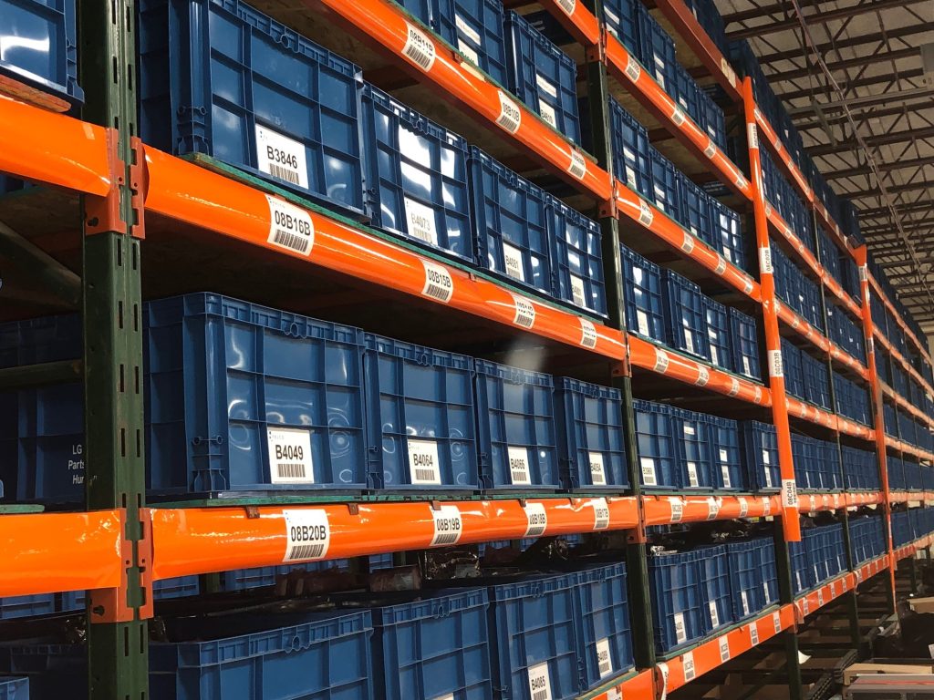 Storage rack with bins